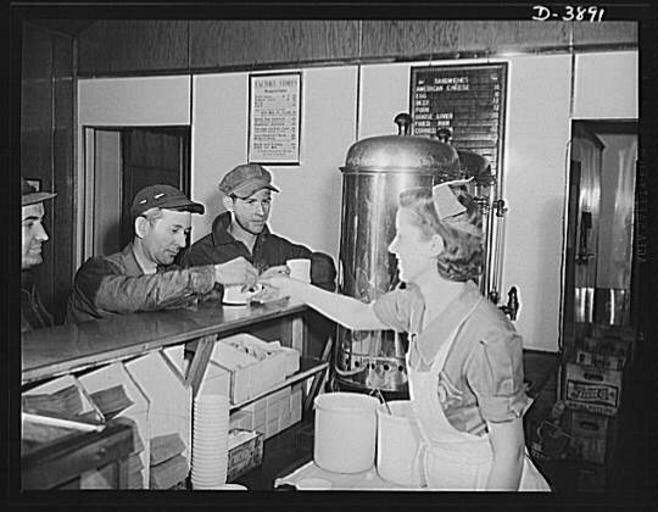 Waitress serving coffee.