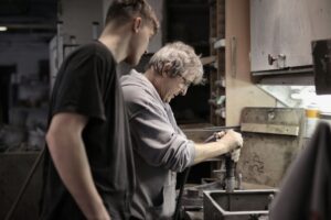 a picture of 2 men working