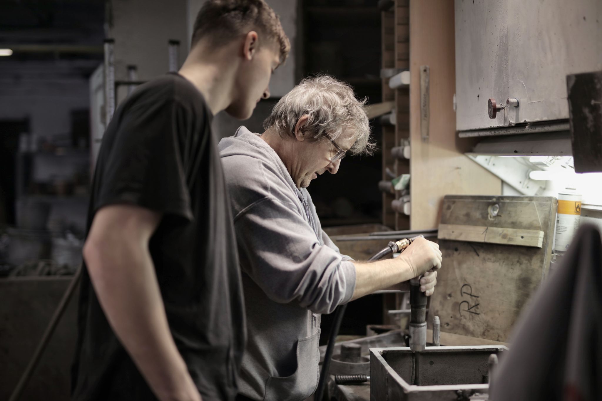 a picture of 2 men working