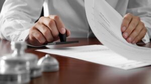 lawyer put the stamp on the document
