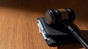 wallet and judge's gavel