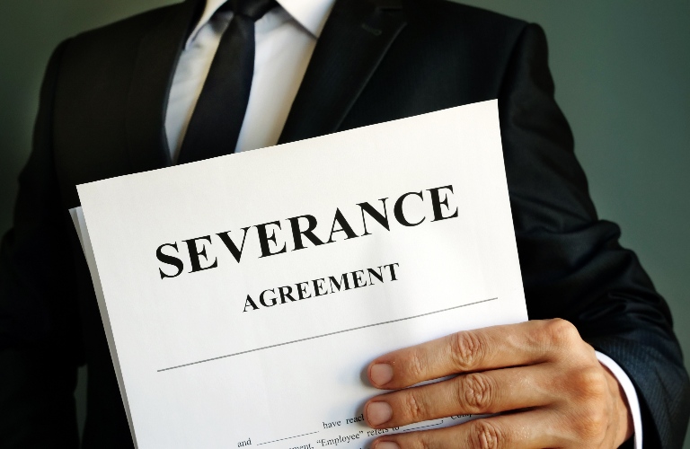 Manager is holding Severance Agreement papers