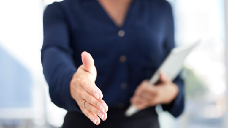 woman with hand out for handshake